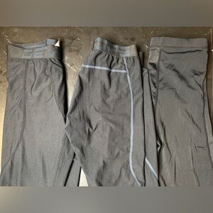 Three pairs of cropped workout leggings all size medium used but great shape‌